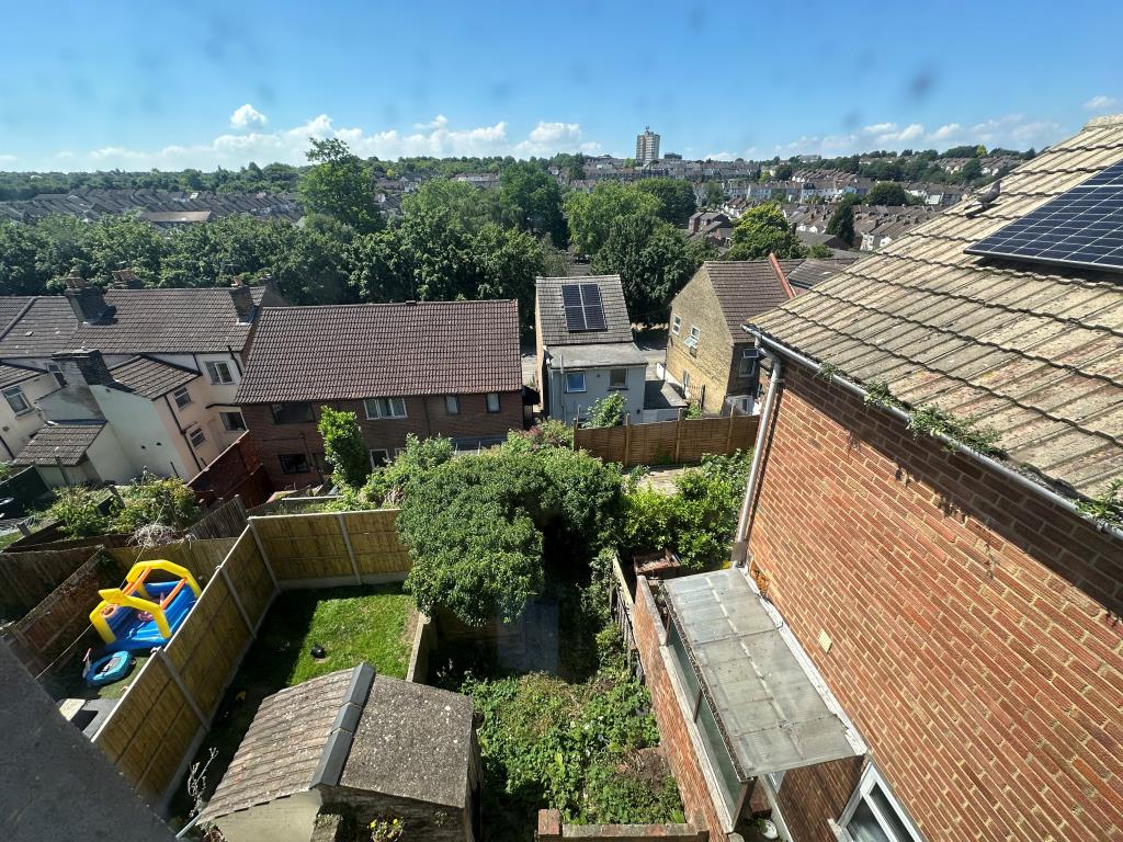 Lot: 155 - END-TERRACE HOUSE FOR REFURBISHMENT - View from bedroom window